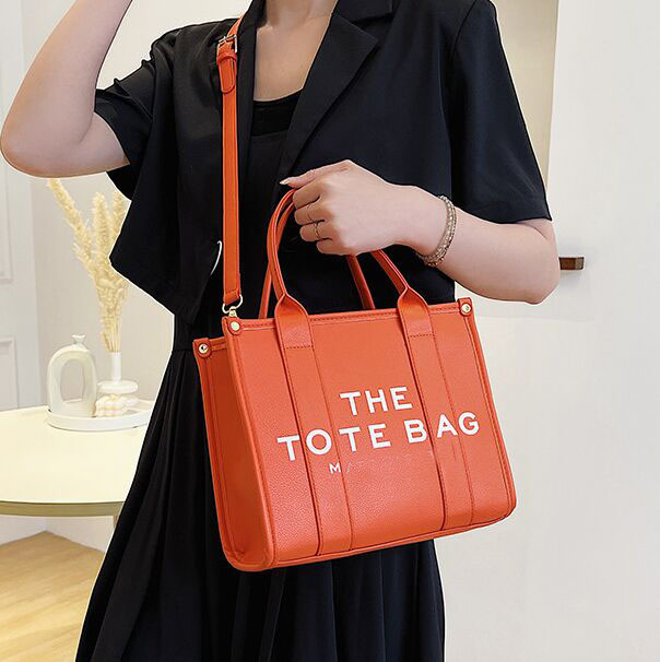 

The pu Leather Tote Bag Marc Womens Handbag Debossed Signature Branding Totes Bags Shoulder Crossbody Colorblock Bags Canvas Large Purses Jobobs g038