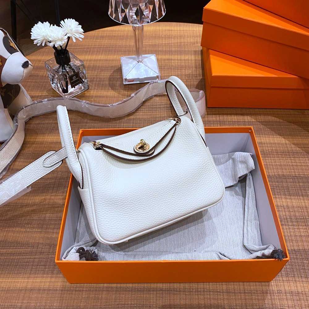 

The Luxury Designer Bags Original first layer of cow leather doctor's bag lychee pattern Lindys one shoulder hand cross-body women's mini 19 LYEI, Golden brown