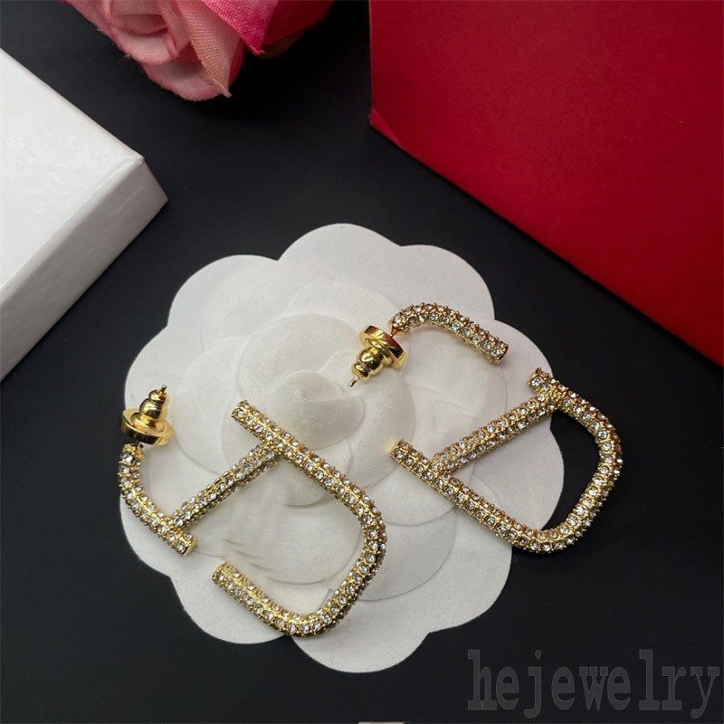 

Zircon 2023 ladies iced out Earrings Designer for Women stainless steel letter v decoration modern orecchini gold color designer earrings creative trendy ZB031 E23