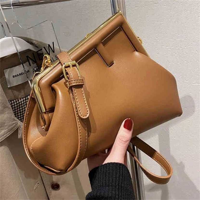 

handbag 2023 Fashion women's bag leather quality Handbag Evening This year's popular women's minority and Shoulder Messenger texture armpit Bag, Brown 1