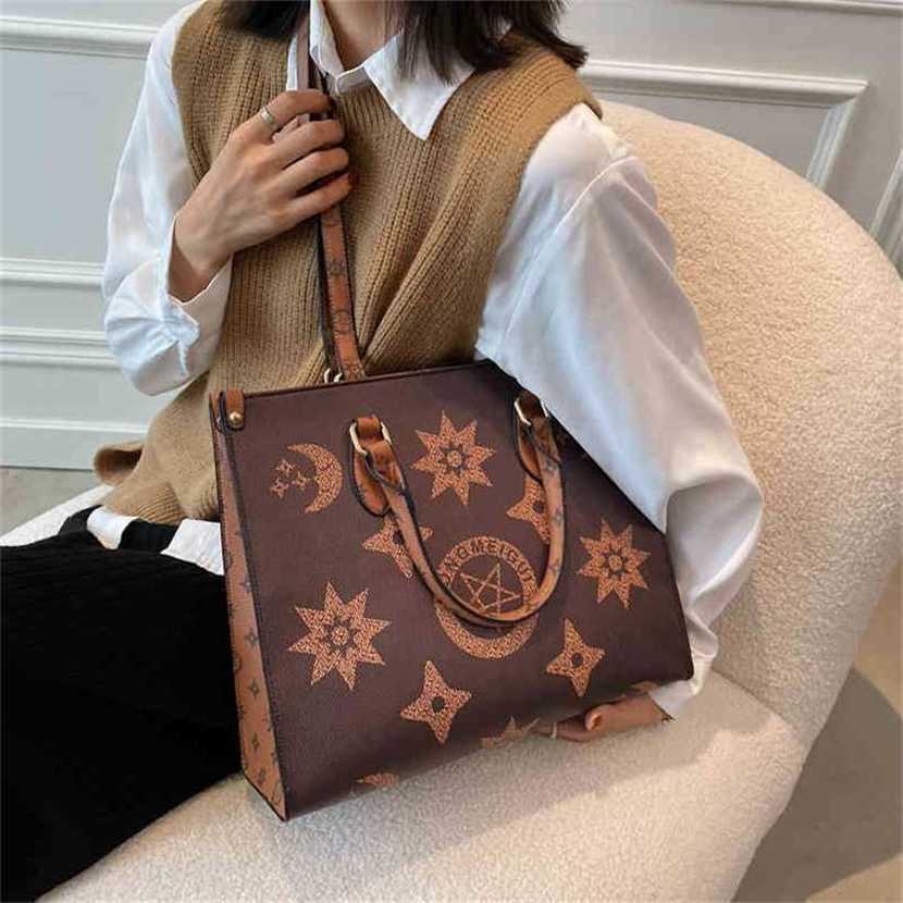 

handbag 2023 Fashion women's bag leather quality Handbag large capacity women's class shoulder style advanced sense Tote commuting Bag, Brown5