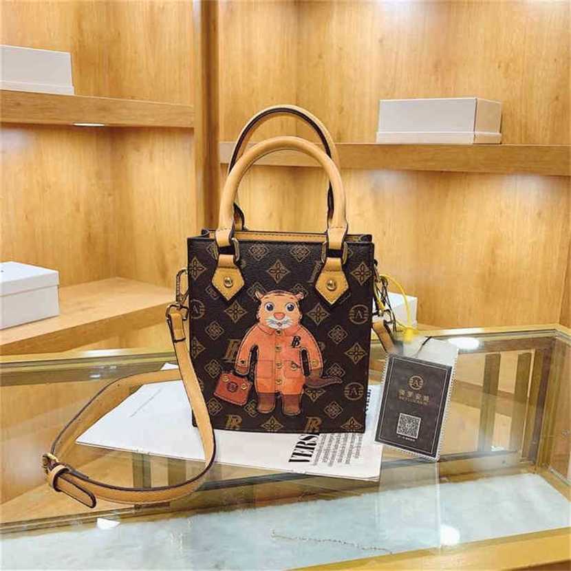 

handbag 2023 Fashion women's bag leather quality Handbag broadcast women's old flower bear Shoulder Messenger simple Hong Kong small square Bag, Brown6