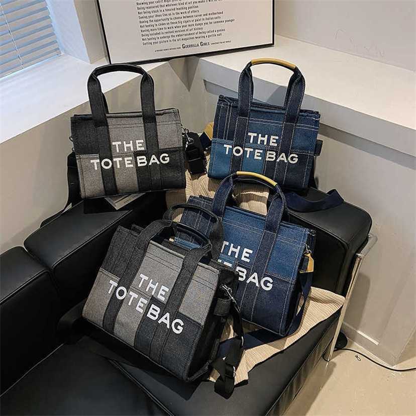 

handbag 2023 Fashion women's bag leather quality handbag fashionable Denim Butot contrast stitching letter shoulder Bag, Black trumpet