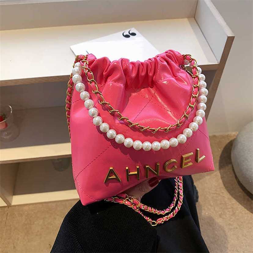 

handbag 2023 Fashion women's bag leather quality handbag fashionable spring fashion line texture sewing pearl chain shoulder popular diagonal bucket Bag, Pink11