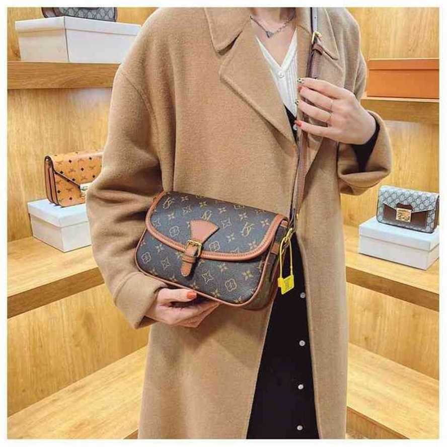 

handbag 2023 Fashion women's bag leather quality Handbag Light luxury old flower postman printed shoulder women's red super fire messenger Bag, Khaki5