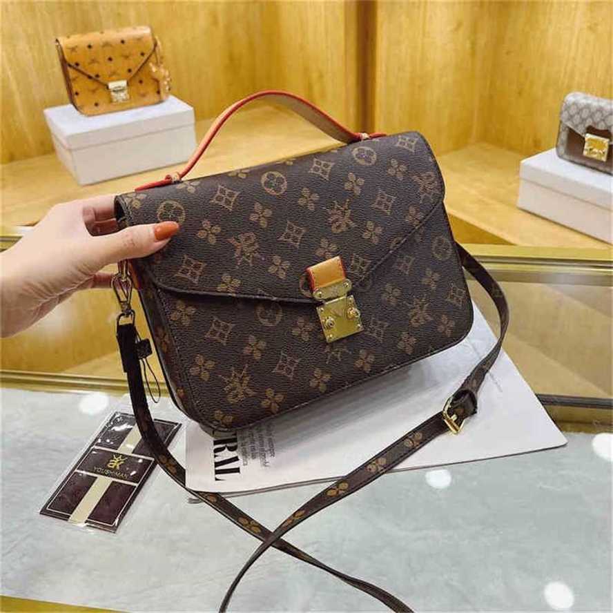 

handbag 2023 Fashion women's bag leather quality Handbag Postman female printing buckle shoulder contrast red portable messenger Bag, Sky blue