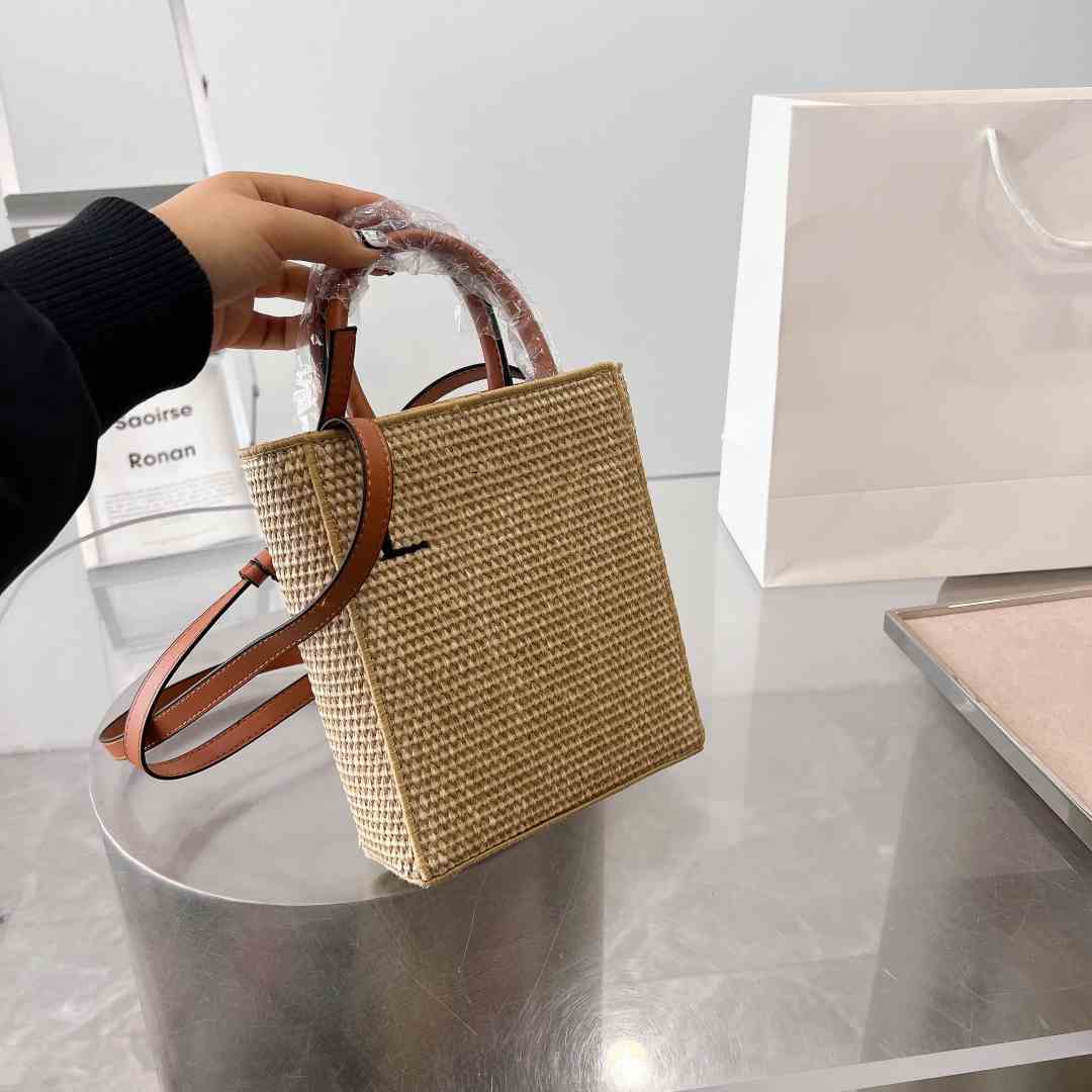 

Spring and summer 2023 new style of your women's straw music bag rabbit pattern fashionable and versatile beach bag square bucket bag, Beige