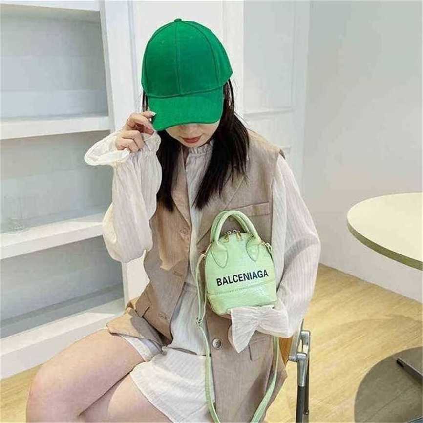 

handbag 2023 Fashion women's bag leather quality Handbag Candy Color Stone Hand-held Style Bright Face Shell classic Bag, Hat single shot contact customer service