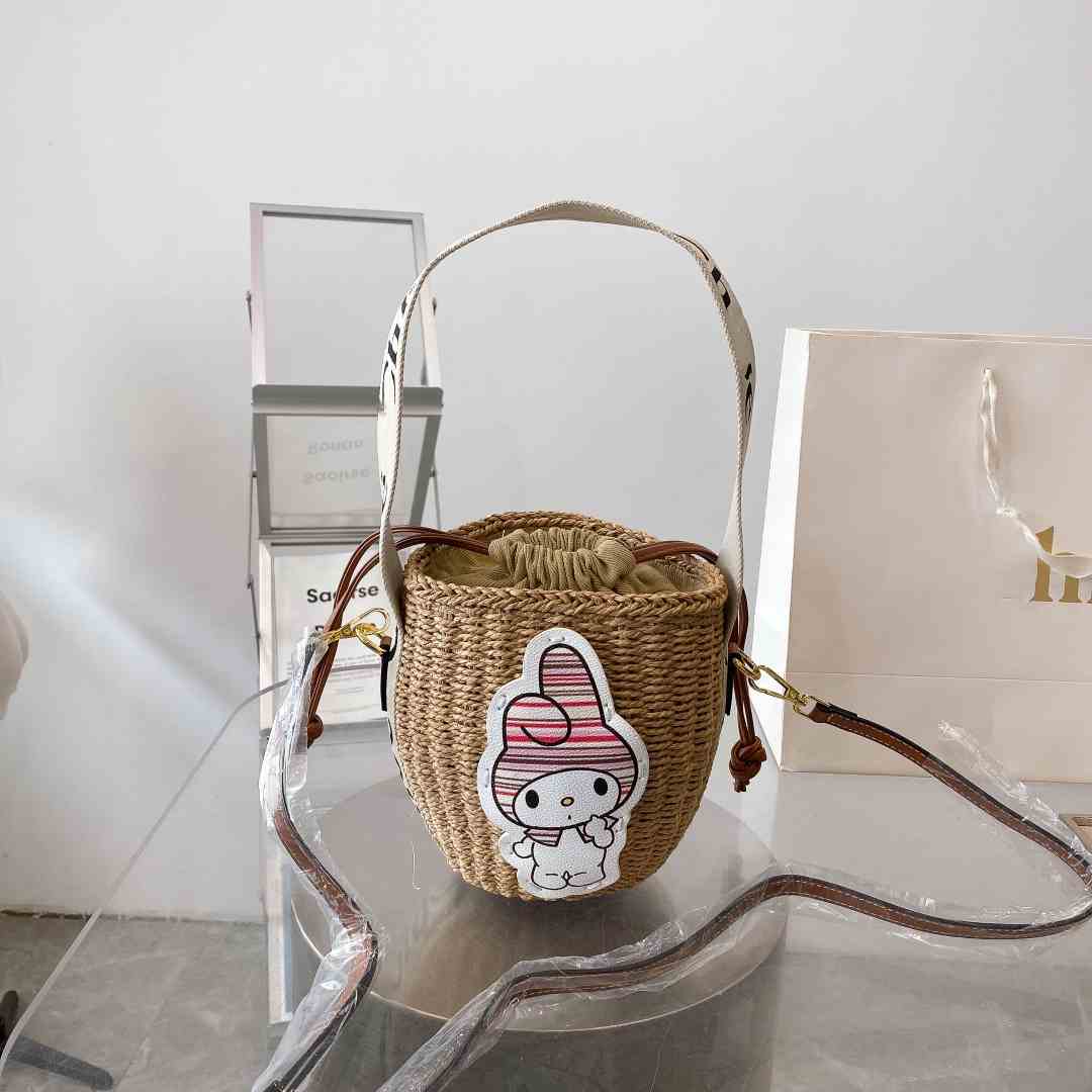 

Spring and summer 2023 new style women's straw bucket bag rabbit pattern fashionable versatile beach bag