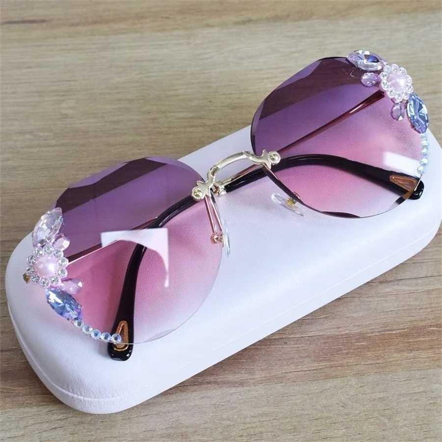 

Sunglasses 2023 new frameless diamond studded round big face thin Women's gradient