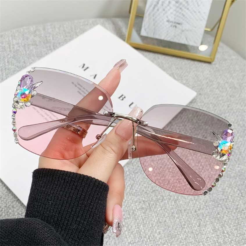 

Sunglasses 2023 new Women's diamond inlaid Sunscreen large frame anti ultraviolet camera magic sunglasses