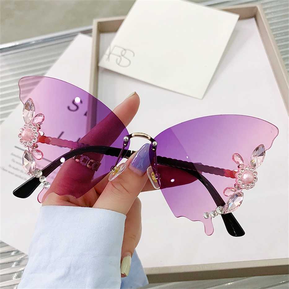 

Sunglasses 2023 new butterfly diamond rimless Prom fashion personality exaggerated Women round big face