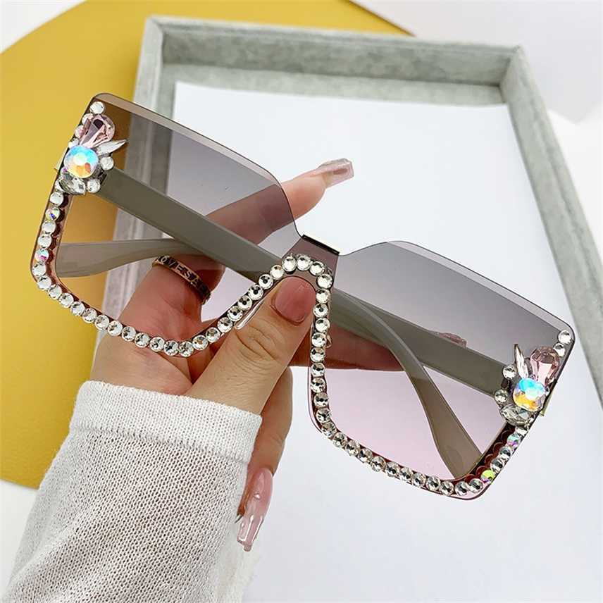 

Sunglasses 2023 new large framed diamond rimless cut edge one-piece for men and women street photography runway fashion sunglasses