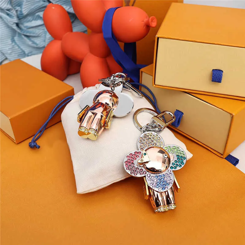 

Diamond Keychain Luxury Designer Sun-flower Doll Key Chains Women Bags Pendant Carabiner Keychains Lovers Keys Buckle High Quality
