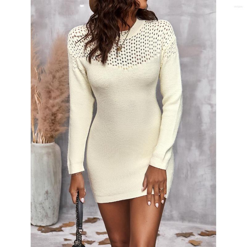 

Casual Dresses WildPinky 2023 Spring Autumn Long Sleeve Bodycon Dress For Women Winter White Hollow Out Knitted Sweater Mini Woman
