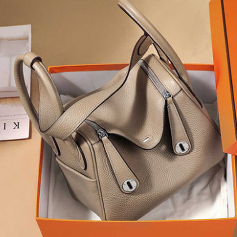 

Lindys Bags bags 2022 new fashion litchi pattern Bag Mini Doctor Leather Women's bag Single Shoulder Messenger Hand medicine ayw, Orange silver button small 26cm