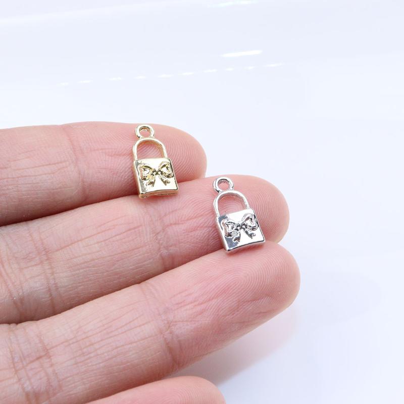 

Charms Eruifa 20pcs 10mm Wholesell Pretty Mini Lock Charm Zinc Alloy Necklace Earring Fashion Jewelry Handmade DIY Pendant 2 Colors