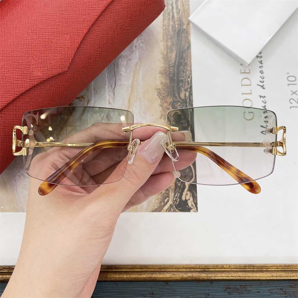 

Sunglasses 2023 new Ins fashion advanced sense female personalized metal frameless color film comfortable men's sunglasses