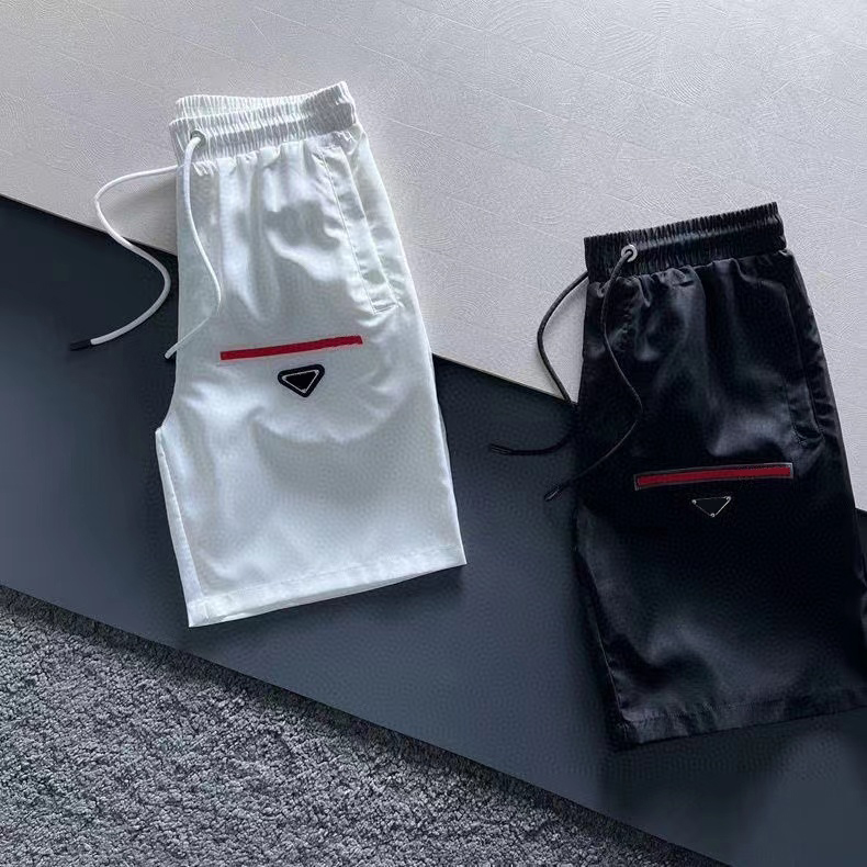 

Mens shorts Triangle letters casual straight five-point casual short beach five-point pants loose clothing