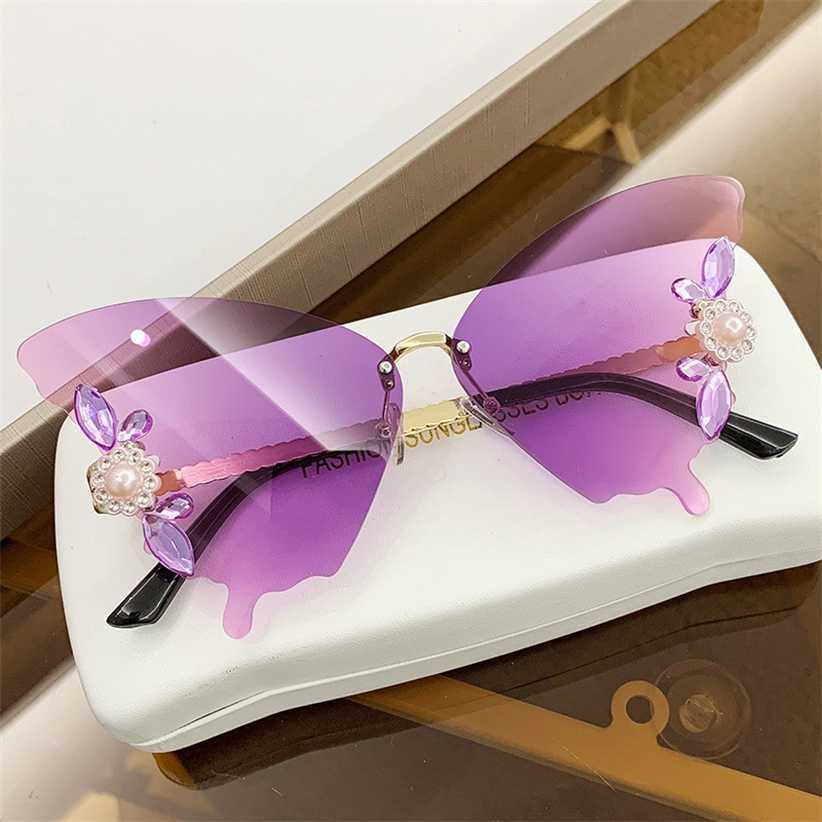 

Sunglasses 2023 new ball butterfly diamond framed sunglasses female trend street photo protection