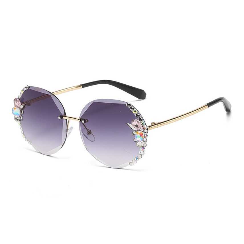 

Sunglasses 2023 new frame rimless diamond anti ultraviolet sunglasses women's big face looks thin