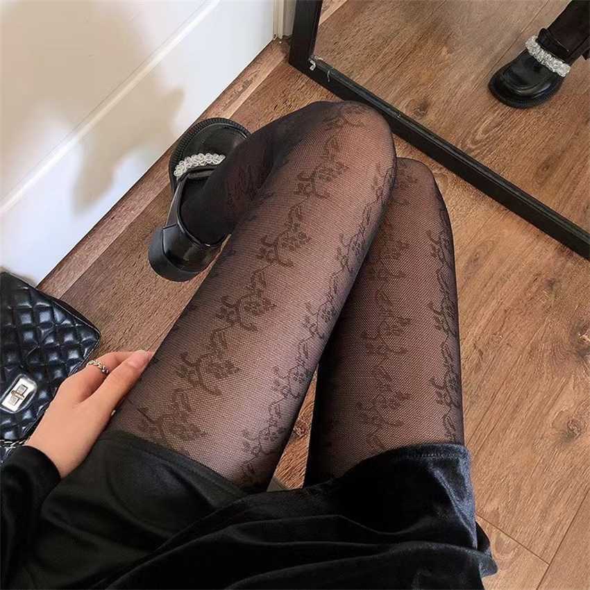 

Silk stockings Women's jacquard spring and summer thin jk white bottom socks sexy flesh flower rattan black silk pantyhose
