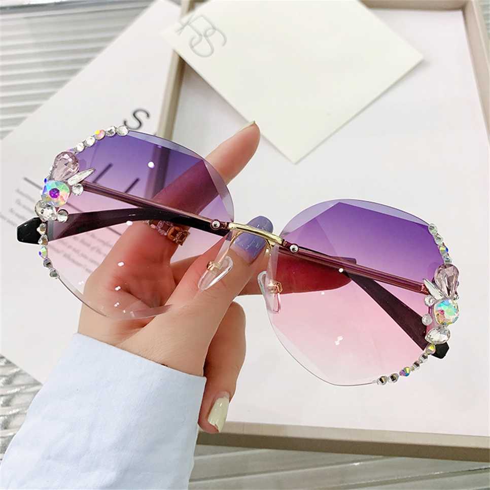

Sunglasses 2023 new frameless sunglasses anti Women's big face looks thin