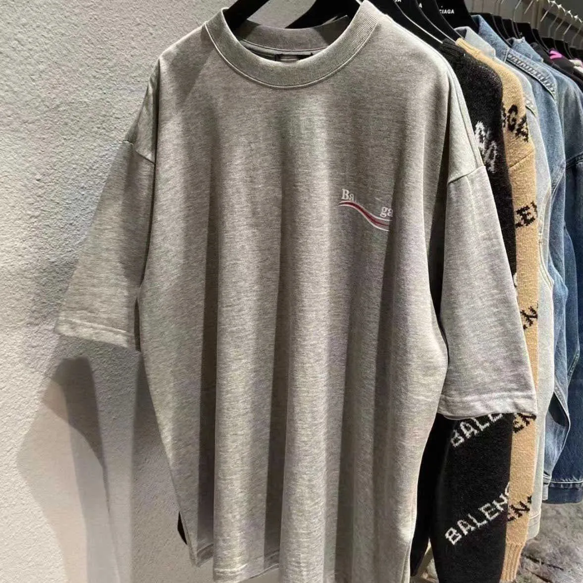 

Designer t Shirt balencigas woman Spring Summer Balenciagas Coke Wave Letter Round Neck Cotton Short Sleeve Loose Version Men's and Women's Black 20 mgs, Sky blue white coke