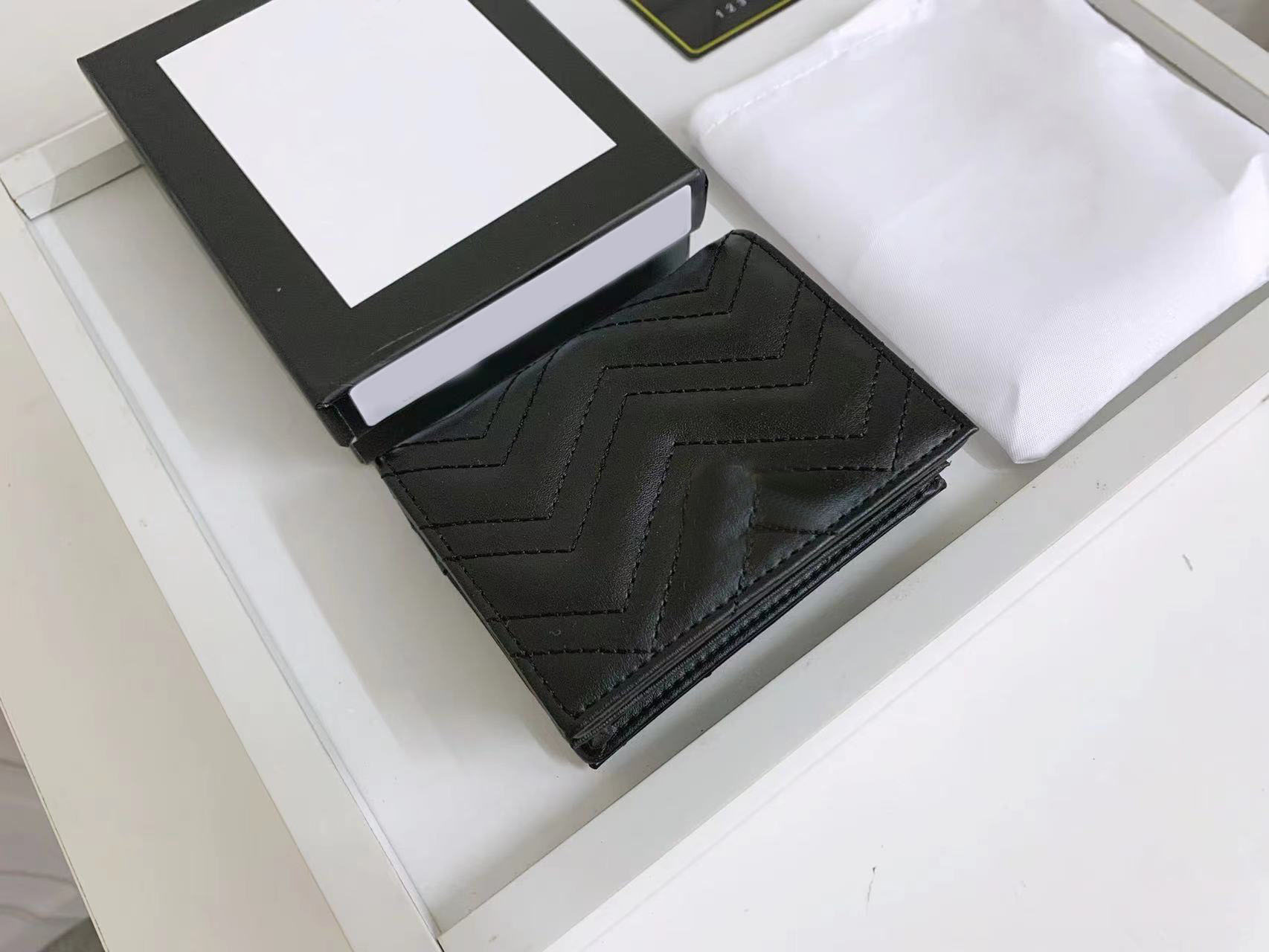 

2023 Fashion Designer's classic women's purse Clamshell card bag in soft quilted V-shaped leather, Black gloss