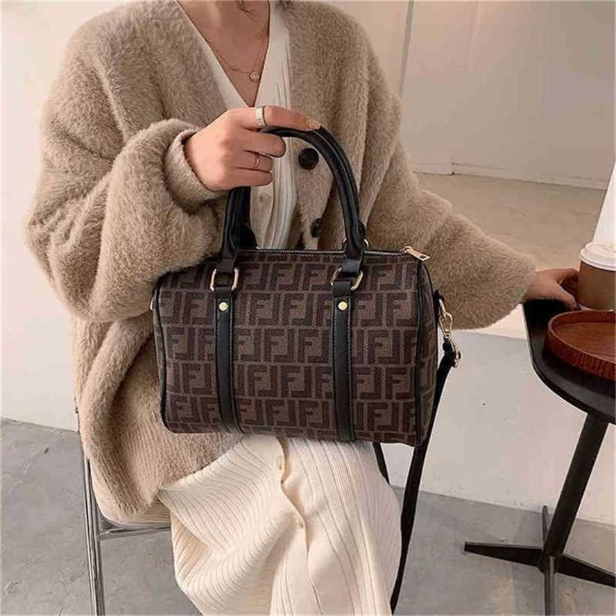 

handbag 2023 Fashion women's bag leather quality Handbag Women contrast letters cylinder pillow Bag