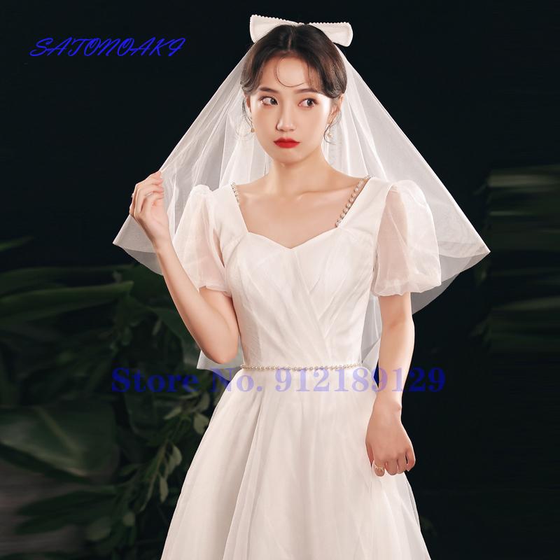 

Bridal Veils 2023 Bowkot Style Wedding Veil With Comb Pearls Irovy Hair Accessories For Bride Voile Mariage Women Velos De Novia Welon, Ivory