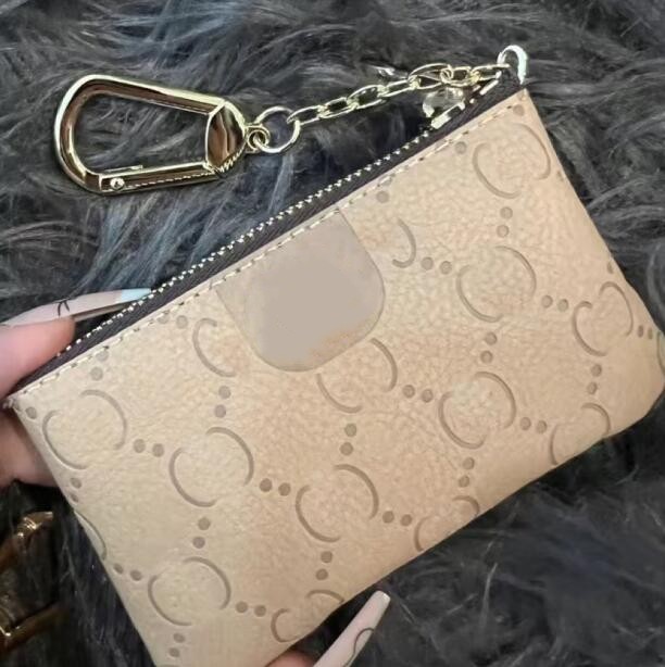 

Designer Keychains Leather Holders Key Pouch Purse Unisex Fashion Womens Mens Coin Card Holder Coin Purses Mini Wallet Bag Accessories Keychain