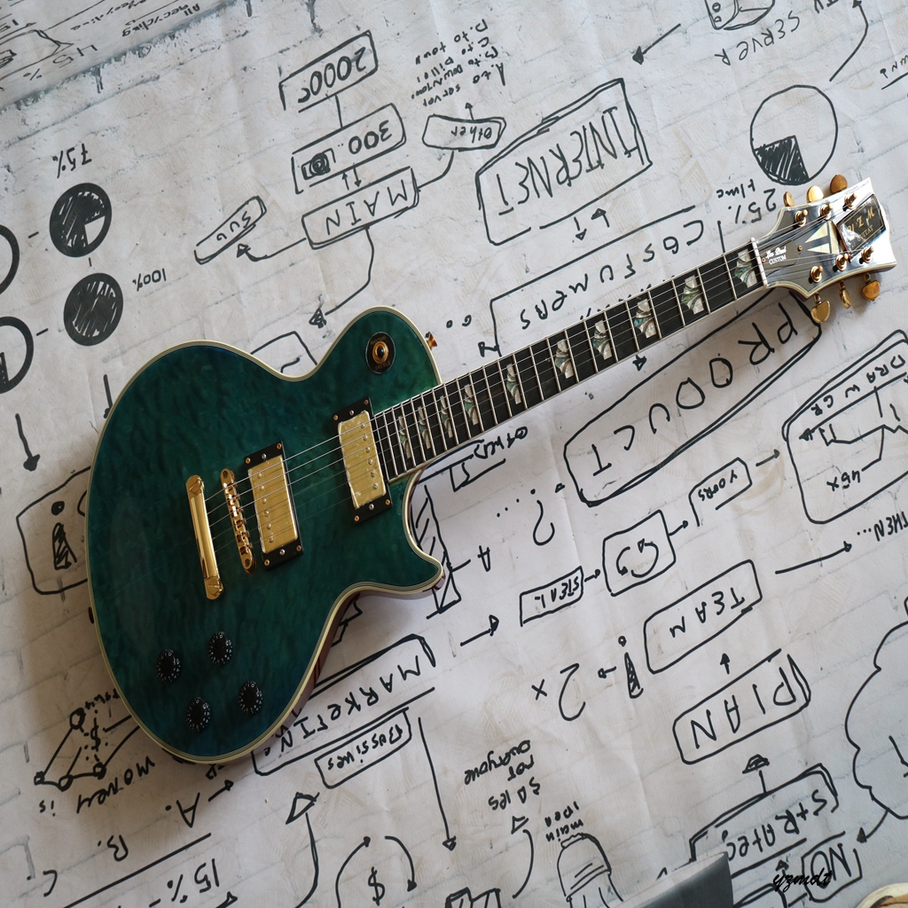 

Green body high-end pickup, shell inlaid fingerboard metal guitar, travel guitar