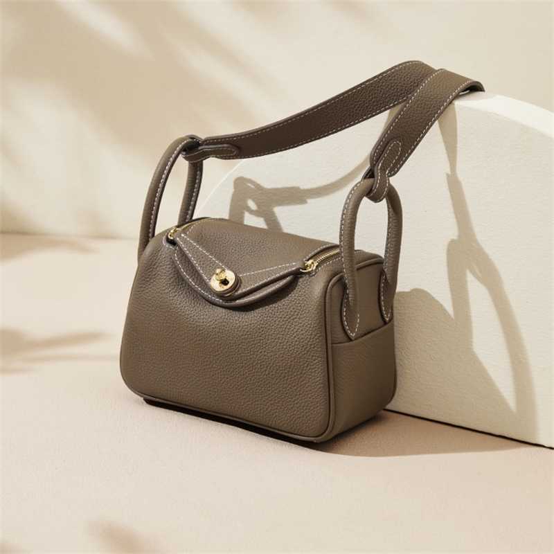 

Bags Lindys bags Bag Women's new lychee grain cowhide pillow bag fashion wide shoulder belt one messenger doctor ayw V0R9, White8