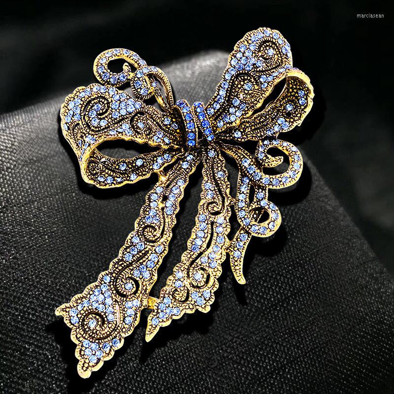 

Brooches SKEDS Vintage Classic Luxury Rhinestone Bow For Women Elegant Bowknot Metal Brooch Pin Wedding Party Accessories Badges