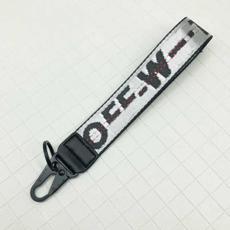 

Fashion Luxury Offs Keychains Brand Key Rings Clear Rubber Keys Ring Classic Men Women Canvas Keychain Embroidery Letters Pendant Belt 3.5x25cm Keyring Fjwi