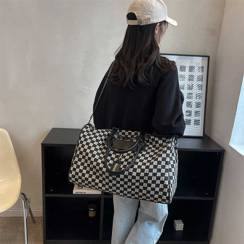 

Duffel Bags Short Distance Travel Bag Women s Portable Korean Version Large Capacity Luggage Men s Lightweight Waterproof Sports Fitness Tote 230316, Black