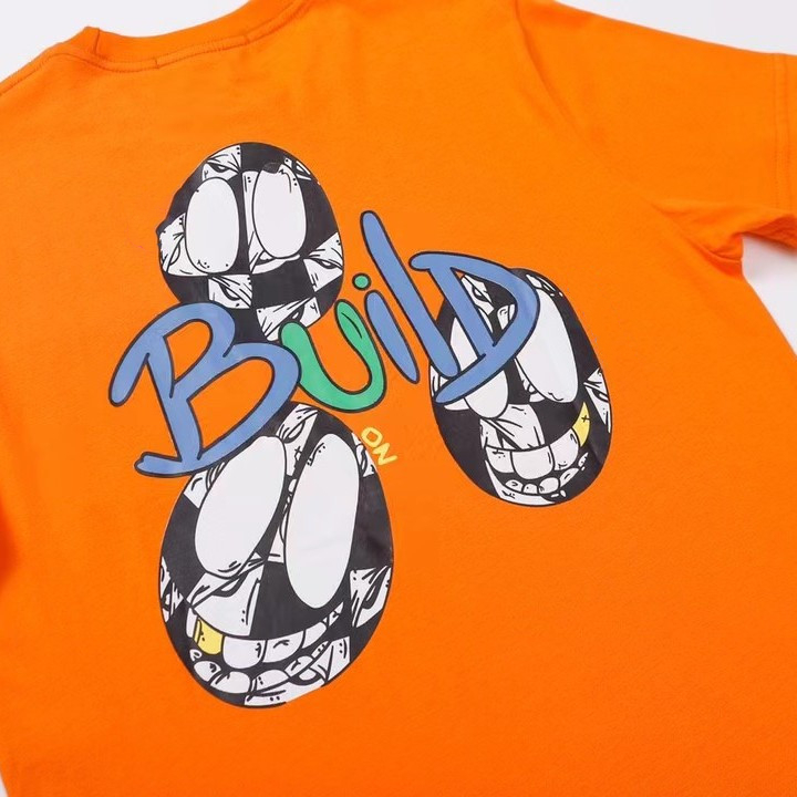 

Men T Shirts Women Orange Graffiti Letters Cartoon Print Loose Casual Round Neck Short Sleeve T-shirts