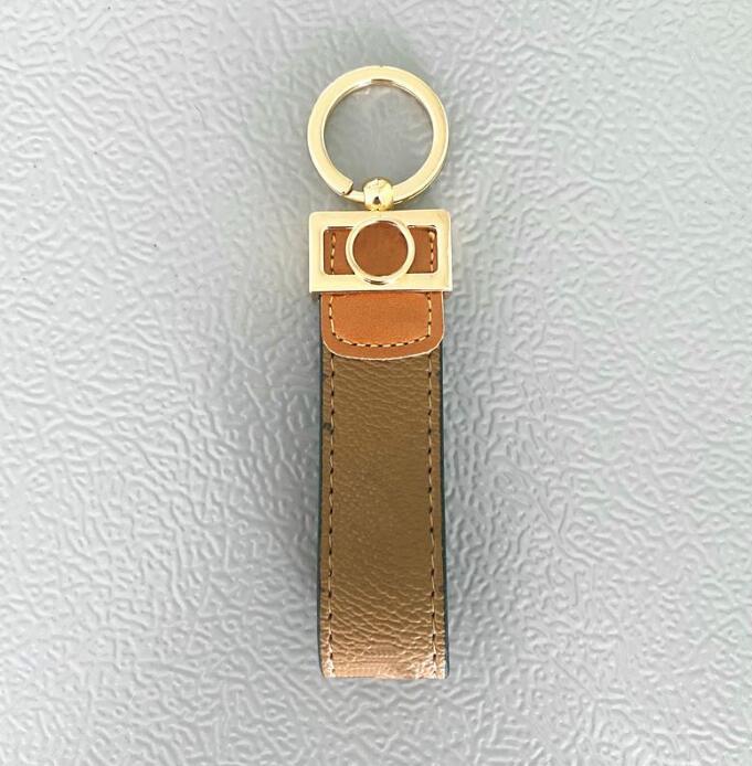 Mode clé boucle voiture porte-clés à la main en cuir porte-clés hommes femmes sac pendentif accessoires AAA +