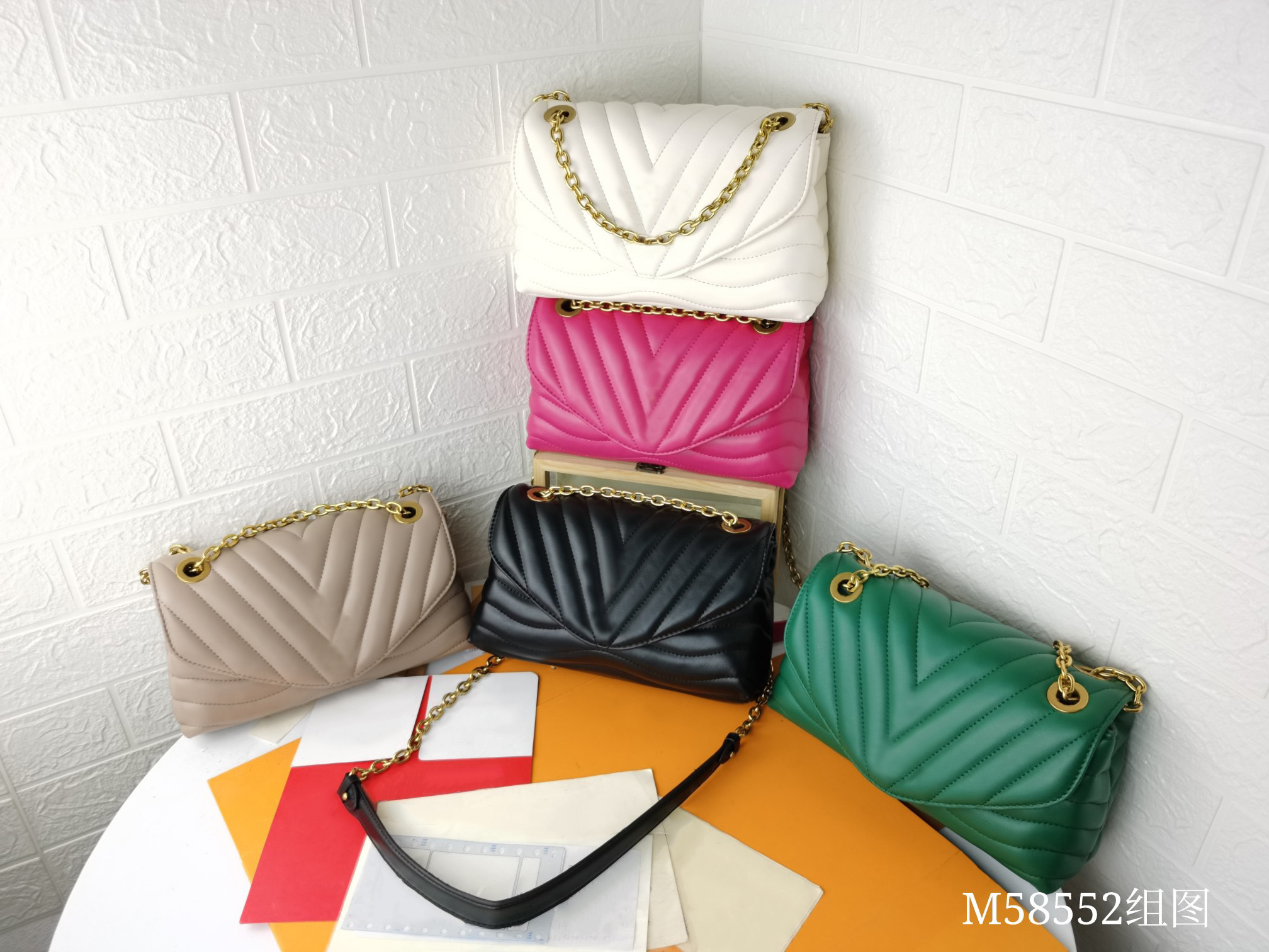 Sac à bandoulière en cuir véritable sac à main WOC chaîne portefeuille carte sac femmes Luxurys créateurs de mode sacs femme fille sacs à main un