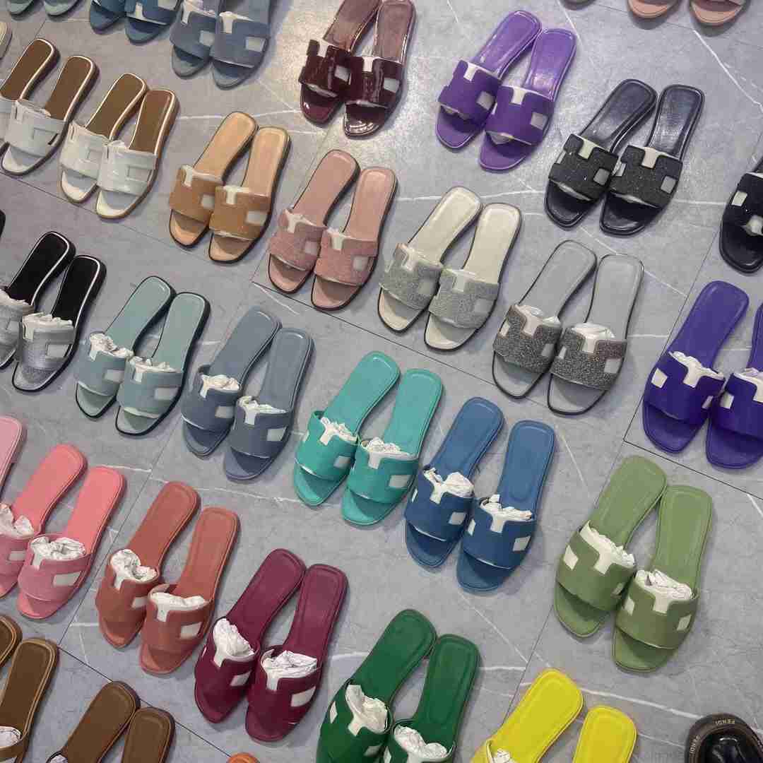 

Designer Slippers Lady Cartoon Big Head Slides Oran Women Classic Open Toe Casual Flat Slide Real Soft Leather Rubber Slipper With Box I5X8