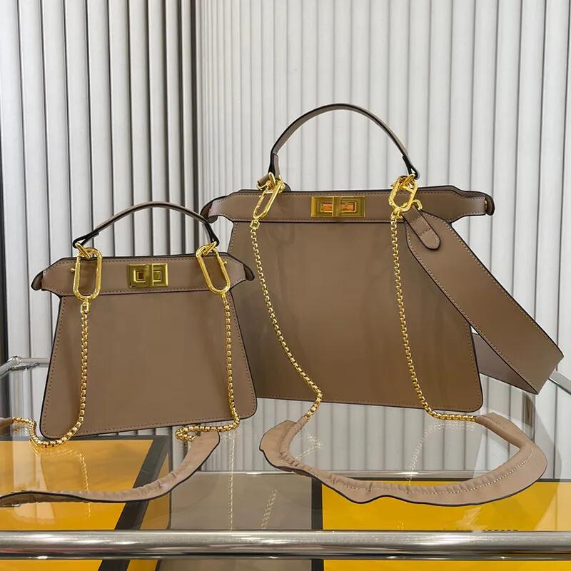

9A Fashion New style totes handbag 304120 Twist the locks on both sides The inner lining is fitted with a zipper pocket Removable shoulder strap 3th, Box