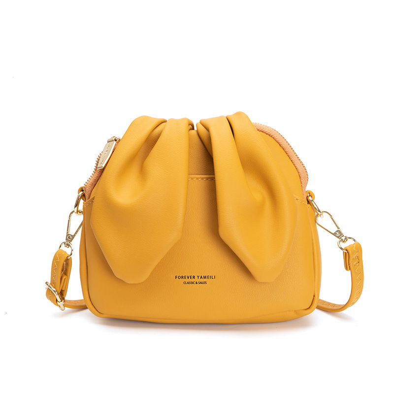

Niche design single crossbody bag 2023 fashion personality net celebrity bucket bag ins style rabbit ears small bag, Yellow