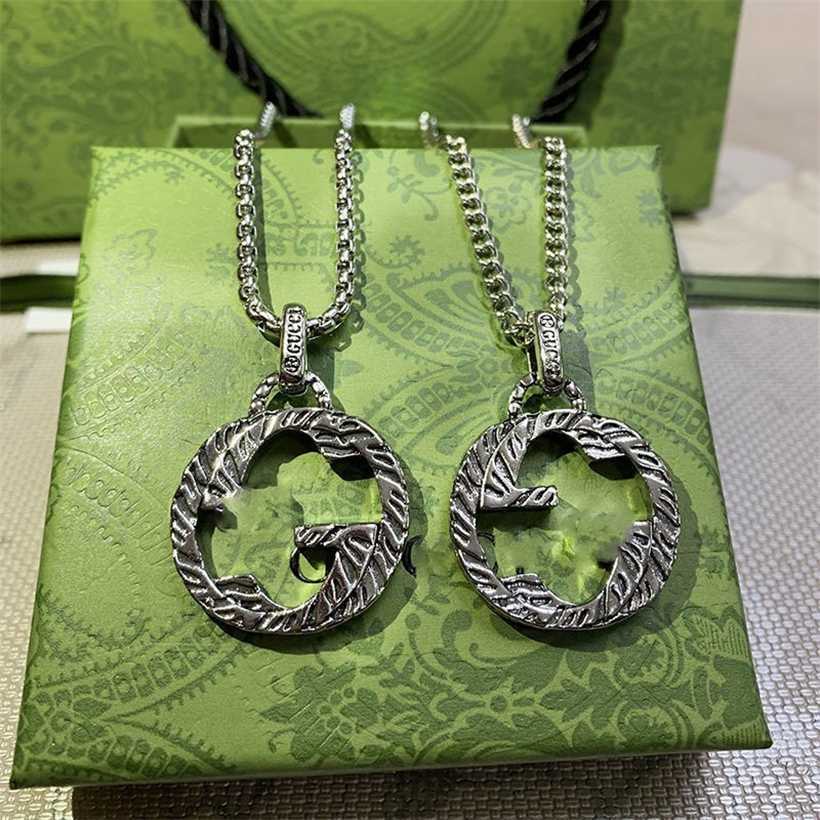 

2023 Designer New Gujia interlocking double g pendant fried dough twist Silver Necklace used men's and women's sweater chain gift