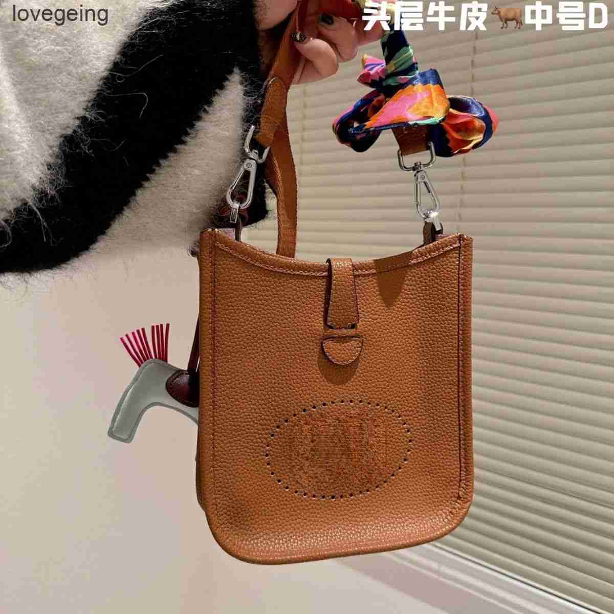 

Designer Bag Cow Evelynbag Top Totes Women's High End Layer Bags Bucket 2023 with Lychee Pattern h Hollow Out Single Shoulder Cross U2ux With MSCP