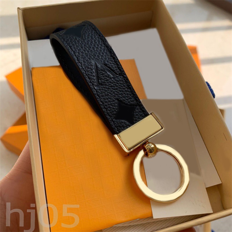 

Letter luxury keychain purse esigner key chain fashion casual canvas leather metal parts gold plated brown pink wallet key buckle bag pendants lanyard PJ047 Q2