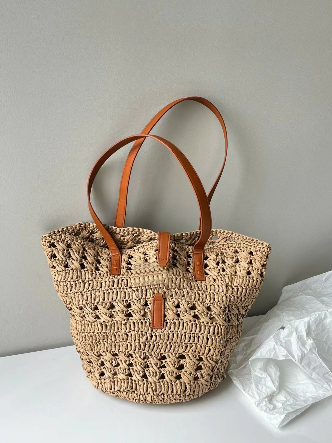 

Designer Panier Bag In Crochet Raffia And Smooth Leather Hollowed Out Brown Straw Basket Tote Bag Gold Letter Hardware Top Handle Handbags Leather Straps Beach Bags, Other colors