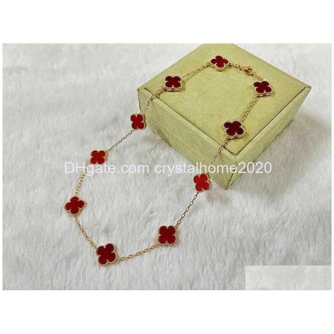 

Pendant Necklaces Luxury Van Brand Clover Designer 18K Gold Cross Chain Lucky Red Stone 15Mm 4 Leaf 10 Flower Otlmz