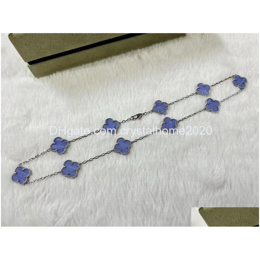

Pendant Necklaces Luxury Van Esigner Sier Cross Chain Light Purple Stone Clover 15Mm 4 Leaf 10 Flower Chok Otw2O