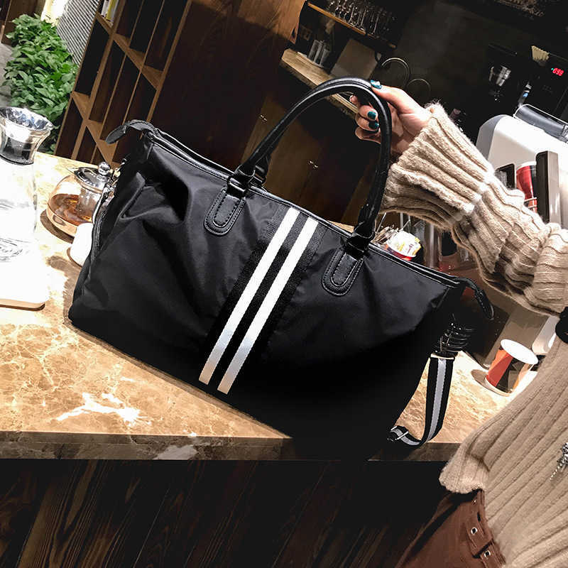 

Duffel Bags New Short Distance Travel Bag Women s Portable Korean Version Luggage Men s Large Capacity Lightweight Sports Fitness 230316, Solid color